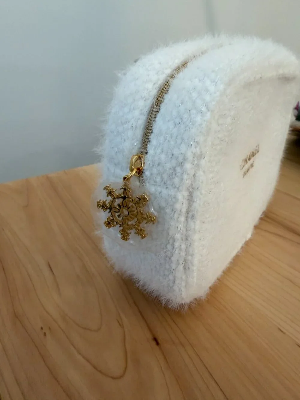 CHANEL Cream Wool Cosmetic Pouch with Gold Logo